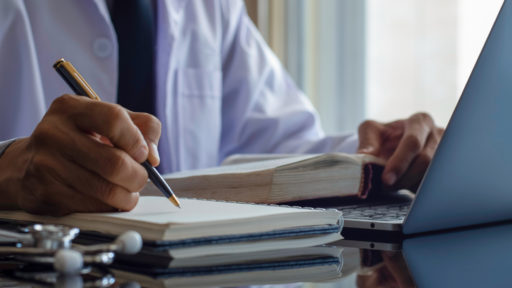 information,work on laptop computer with medical stethoscope on the desk. Online working, telehealth or meditech concept.